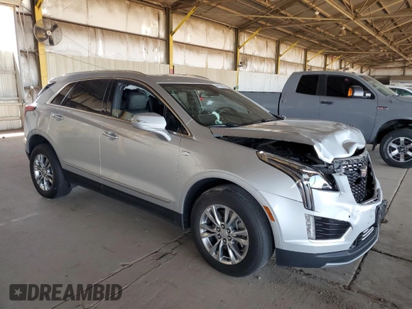 2020 Cadillac XT5 Premium Luxury AWD with VIN 1GYKNDRS4LZ124935, listed as a Copart auction lot 62177965 with 35,671 mi miles and Salvage title. Bid and sale history available at DreamBid. Image 4.