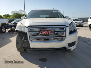 2014 GMC Acadia Denali z VIN 1GKKVTKD2EJ358735, wystawiony jako Copart lot #52299545 z przebiegiem 192 817 mil mil oraz Czysty tytuł • Clean title. Historia ofert i sprzedaży dostępna na DreamBid. Obrazek 5.