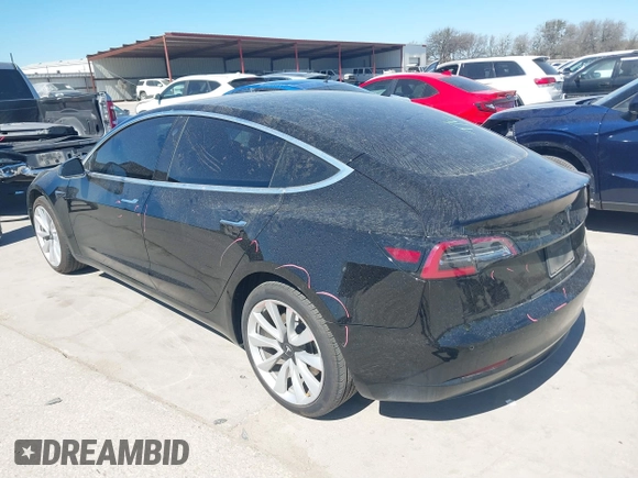 2020 Tesla Model 3 Standard Range Plus with VIN 5YJ3E1EAXLF614002, listed as a IAAI auction lot 41758898 with 42,363 mi miles and . Bid and sale history available at DreamBid. Image 3.