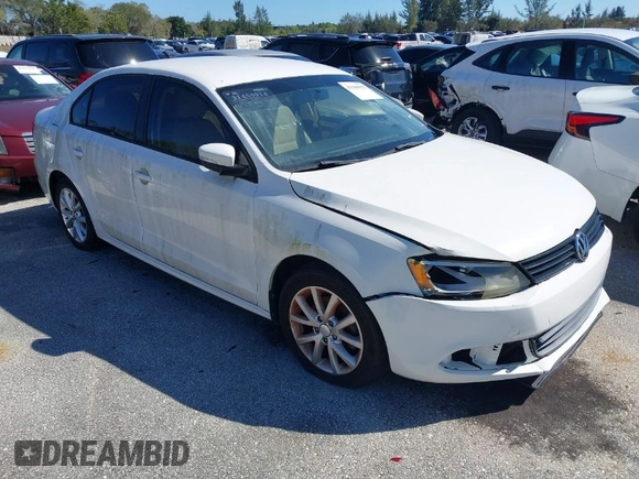 2012 Volkswagen Jetta Sedan SE w/Convenience with VIN 3VWDX7AJ2CM367784, listed as a IAAI auction lot 41386552 with 104,744 mi miles. Bid and sale history available at carsss.com. Image 1.