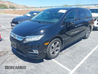 2018 Honda Odyssey Touring with VIN 5FNRL6H8XJB026247, listed as a IAAI auction lot 42298961 with 66,571 mi miles and . Bid and sale history available at DreamBid. Image 17.