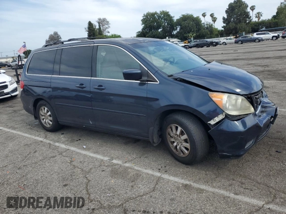 2010 Honda Odyssey EX with VIN 5FNRL3H46AB105054, listed as a Copart auction lot 56710665 with 118,156 mi miles and Salvage title. Bid and sale history available at DreamBid. Image 4.