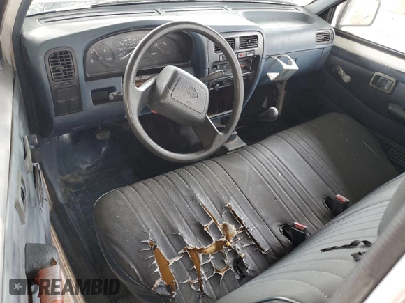 1995 Nissan Frontier with VIN 1N6SD11S3SC379478, listed as a Copart auction lot 52209415 with 21,068 mi miles and Salvage title. Bid and sale history available at DreamBid. Image 8.