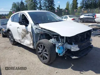 2017 Mazda CX-5 Grand Touring with VIN JM3KFBDL9H0163031, listed as a IAAI auction lot 42098819 with 81,781 mi miles. Bid and sale history available at carsss.com. Image 6.
