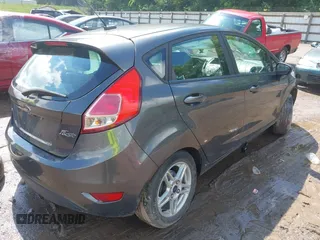 2019 Ford Fiesta SE z VIN 3FADP4EJ9KM125252, wystawiony jako IAAI lot #42221622 z przebiegiem 57 366 mil mil oraz . Historia ofert i sprzedaży dostępna na DreamBid. Obrazek 4.
