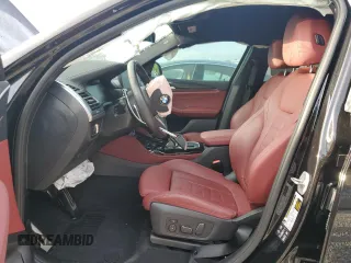 2024 BMW X4 M40i z VIN 5UX43DT00R9V20010, wystawiony jako Copart lot #51654125 z przebiegiem Nie podano mil oraz Nie do naprawy • Non repairable. Historia ofert i sprzedaży dostępna na DreamBid. Obrazek 7.