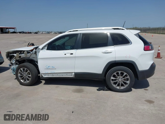 2019 Jeep Cherokee Latitude Plus with VIN 1C4PJLLB5KD301109, listed as a IAAI auction lot 41858478 with 52,647 mi miles and . Bid and sale history available at DreamBid. Image 14.