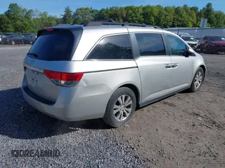 2014 Honda Odyssey EX-L with VIN 5FNRL5H61EB128311, listed as a IAAI auction lot 42334932 with 270,135 mi miles and . Bid and sale history available at DreamBid. Image 4.