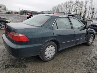 2000 Honda Accord LX z VIN 1HGCG5648YA154043, wystawiony jako Copart lot #51854515 z przebiegiem 176 150 mil mil oraz Szkoda całkowita • Salvage title. Historia ofert i sprzedaży dostępna na DreamBid. Obrazek 3.