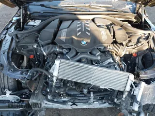 2024 BMW 8 Series M850i with VIN WBAGV8C00RCN95483, listed as a IAAI auction lot 41294811 with 1 mi miles. Bid and sale history available at carsss.com. Image 10.