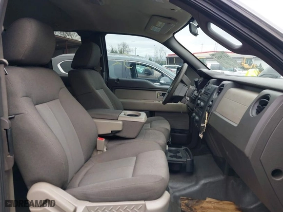 2009 Ford F-150 STX with VIN 1FTRX14869FA09093, listed as a IAAI auction lot 41921152 with 173,744 mi miles. Bid and sale history available at carsss.com. Image 5.