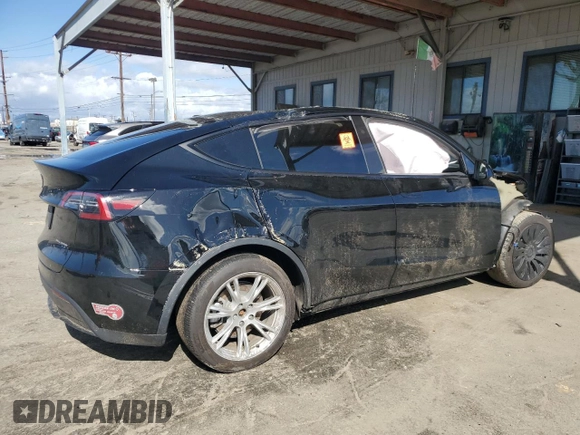 2024 Tesla Model Y Long Range z VIN 7SAYGDEE1RA247973, wystawiony jako Copart lot #45679205 z przebiegiem 22 739 mil mil oraz Szkoda całkowita • Salvage title. Historia ofert i sprzedaży dostępna na DreamBid. Obrazek 3.