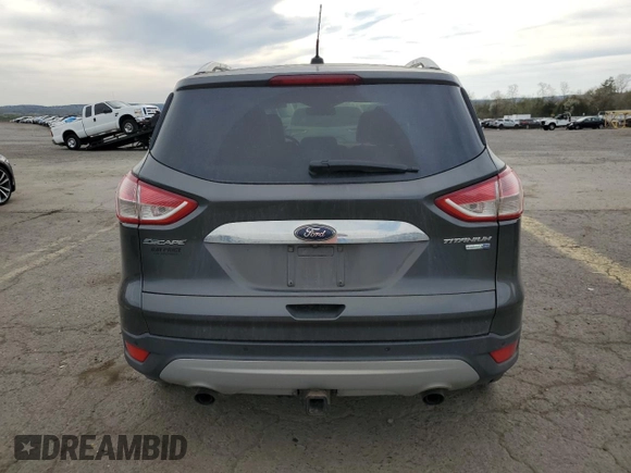 2016 Ford Escape Titanium with VIN 1FMCU9J95GUC17688, listed as a Copart auction lot 53234575 with 124,030 mi miles and Salvage Title. Bid and sale history available at DreamBid. Image 6.