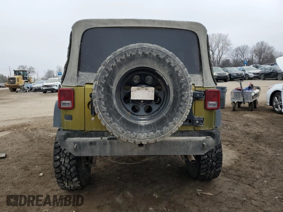 2007 Jeep Wrangler Unlimited Rubicon с VIN 1J4GA691X7L145737, выставлен на аукционе Copart как лот 86277914 с пробегом 285 624 миль миль и Списание • Salvage title. История ставок и продаж доступна на DreamBid. Изображение 6.