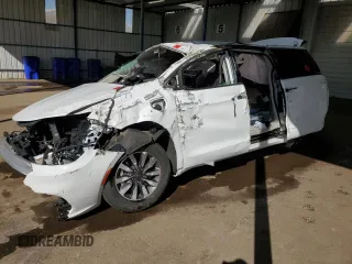 2023 Chrysler Pacifica Hybrid Touring L z VIN 2C4RC1L79PR554313, wystawiony jako Copart lot #53980865 z przebiegiem Nie podano mil oraz Nie do naprawy • Non repairable. Historia ofert i sprzedaży dostępna na DreamBid. Obrazek 1.