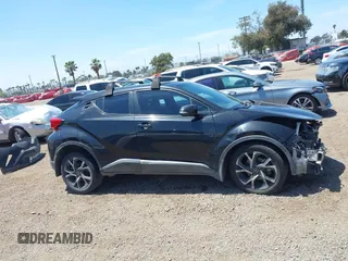 2018 Toyota C-HR XLE z VIN NMTKHMBX3JR024079, wystawiony jako IAAI lot #42110896 z przebiegiem 139 853 mil mil oraz . Historia ofert i sprzedaży dostępna na DreamBid. Obrazek 13.