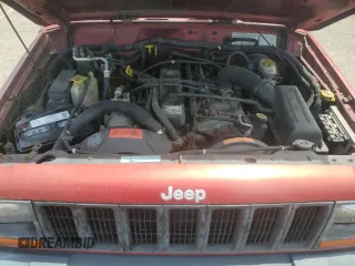 1998 Jeep Cherokee Sport with VIN 1J4FJ68S2WL285432, listed as a Copart auction lot 57183145 with 284,162 mi miles and Clean title. Bid and sale history available at DreamBid. Image 12.
