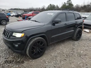 2014 Jeep Grand Cherokee Limited with VIN 1C4RJEBT5EC213332, listed as a Copart auction lot 87583515 with 152,409 mi miles and Salvage Title. Bid and sale history available at DreamBid. Image 1.
