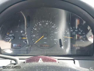 1999 Mercedes-Benz M-Class with VIN 4JGAB54E6XA144914, listed as a IAAI auction lot 42072406 with 125,901 mi miles. Bid and sale history available at carsss.com. Image 7.