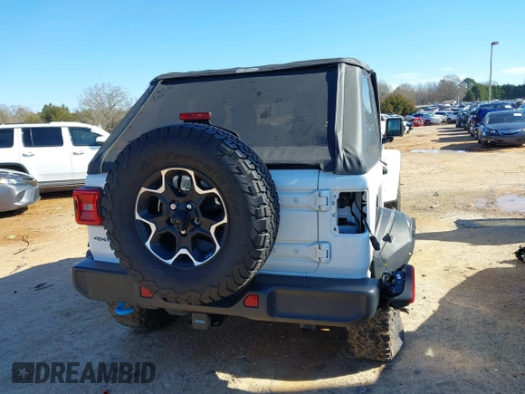 2023 Jeep Wrangler Rubicon with VIN 1C4JJXR64PW586369, listed as a IAAI auction lot 41587561 with 16,038 mi miles and . Bid and sale history available at DreamBid. Image 17.