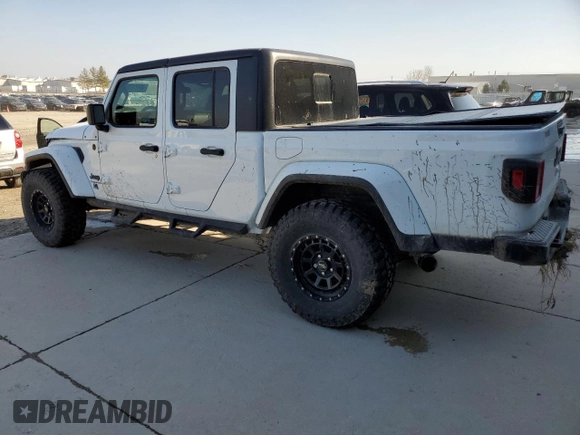 2021 Jeep Gladiator Willys with VIN 1C6HJTAGXML623599, listed as a Copart auction lot 48971735 with 35,052 mi miles and Salvage Title. Bid and sale history available at carsss.com. Image 2.