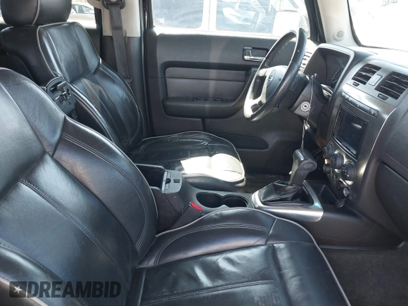 2007 Hummer H3 SUV with VIN 5GTDN13E578153252, listed as a IAAI auction lot 42003767 with 130,810 mi miles. Bid and sale history available at carsss.com. Image 5.