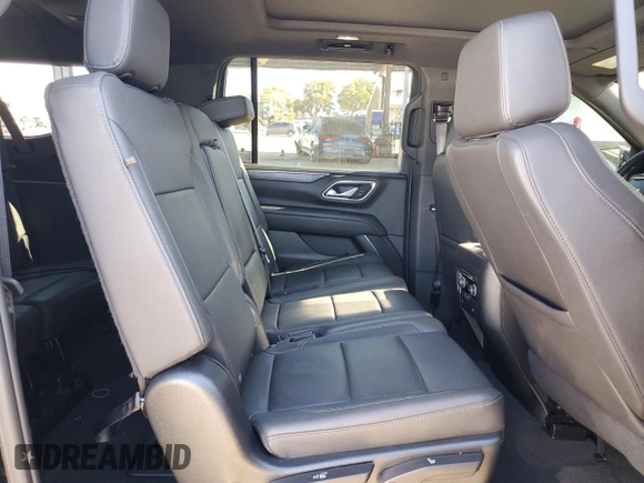 2023 Chevrolet Suburban z VIN 1GNSKDKL2PR286237, wystawiony jako Copart lot #46179735 z przebiegiem 29 518 mil mil oraz Szkoda całkowita • Salvage title. Historia ofert i sprzedaży dostępna na DreamBid. Obrazek 11.