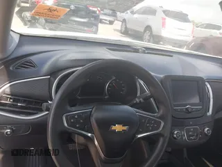 2018 Chevrolet Malibu LT z VIN 1G1ZD5ST9JF125831, wystawiony jako IAAI lot #42443325 z przebiegiem Nie podano mil oraz . Historia ofert i sprzedaży dostępna na DreamBid. Obrazek 7.