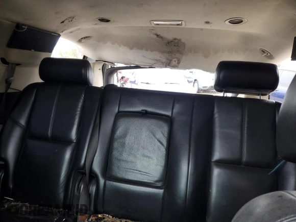 2007 Chevrolet Tahoe LT z VIN 1GNFK13097R154838, wystawiony jako Copart lot #54985145 z przebiegiem Nie podano mil oraz Szkoda całkowita • Salvage title. Historia ofert i sprzedaży dostępna na DreamBid. Obrazek 10.