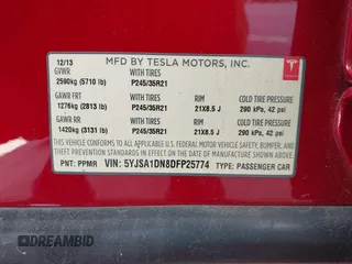 2013 Tesla Model S with VIN 5YJSA1DN8DFP25774, listed as a IAAI auction lot 41998095 with 135,671 mi miles and . Bid and sale history available at carsss.com. Image 9.