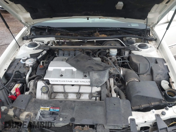 1997 Cadillac Eldorado ESC z VIN 1G6EL12Y6VU614754, wystawiony jako IAAI lot #41543611 z przebiegiem 73 273 mil mil oraz . Historia ofert i sprzedaży dostępna na DreamBid. Obrazek 10.