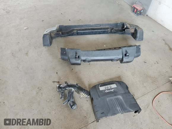 2012 Jeep Wrangler Unlimited Sahara with VIN 1C4BJWEG3CL195271, listed as a Copart auction lot 59947235 with 212,819 mi miles and Salvage title. Bid and sale history available at DreamBid. Image 12.