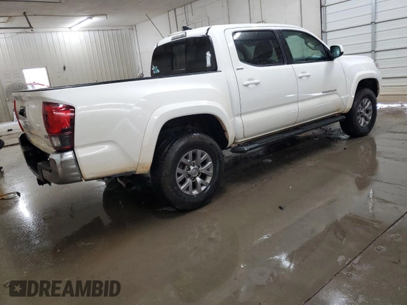 2018 Toyota Tacoma SR5 with VIN 3TMAZ5CN7JM074058, listed as a Copart auction lot 51586455 with 117,877 mi miles and Salvage Title. Bid and sale history available at DreamBid. Image 3.