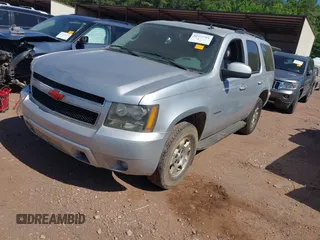2014 Chevrolet Tahoe LT with VIN 1GNSCBE00ER147899, listed as a IAAI auction lot 42322761 with 299,342 mi miles and . Bid and sale history available at DreamBid. Image 17.