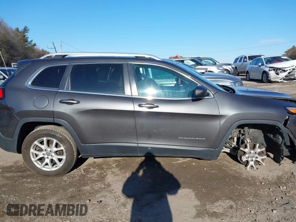 2015 Jeep Cherokee Latitude with VIN 1C4PJMCSXFW725644, listed as a IAAI auction lot 41312764 with 191,714 mi miles and . Bid and sale history available at DreamBid. Image 14.