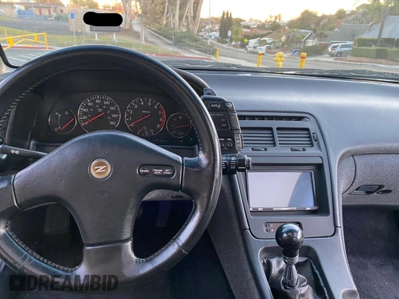 1990 Nissan 300ZX z VIN JN1RZ24A6LX013894, wystawiony jako Copart lot #59821625 z przebiegiem 107 310 mil mil oraz Szkoda całkowita • Salvage title. Historia ofert i sprzedaży dostępna na DreamBid. Obrazek 9.