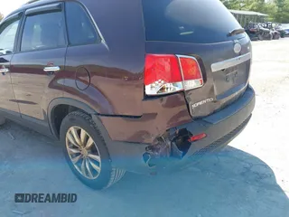 2012 Kia Sorento LX with VIN 5XYKTCA64CG279195, listed as a IAAI auction lot 42144679 with 116,690 mi miles. Bid and sale history available at carsss.com. Image 6.
