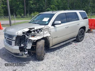 2015 Chevrolet Tahoe LT z VIN 1GNSCBKC7FR140125, wystawiony jako IAAI lot #42279760 z przebiegiem 201 335 mil mil oraz . Historia ofert i sprzedaży dostępna na DreamBid. Obrazek 2.
