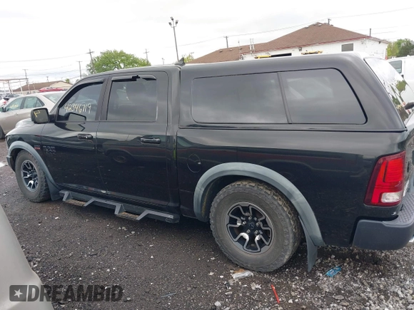 2016 Ram 1500 Rebel z VIN 1C6RR7YT0GS100285, wystawiony jako IAAI lot #42346719 z przebiegiem 103 309 mil mil oraz . Historia ofert i sprzedaży dostępna na DreamBid. Obrazek 14.