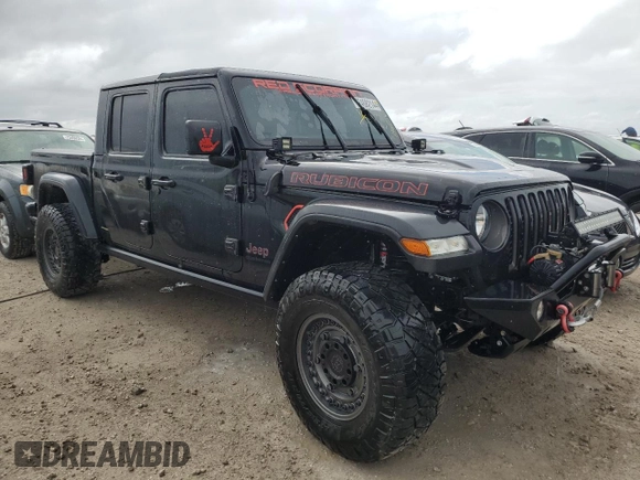 2022 Jeep Gladiator Rubicon with VIN 1C6JJTBG5NL101657, listed as a Copart auction lot 74682144 with 13,352 mi miles and Non repairable. Bid and sale history available at DreamBid. Image 4.