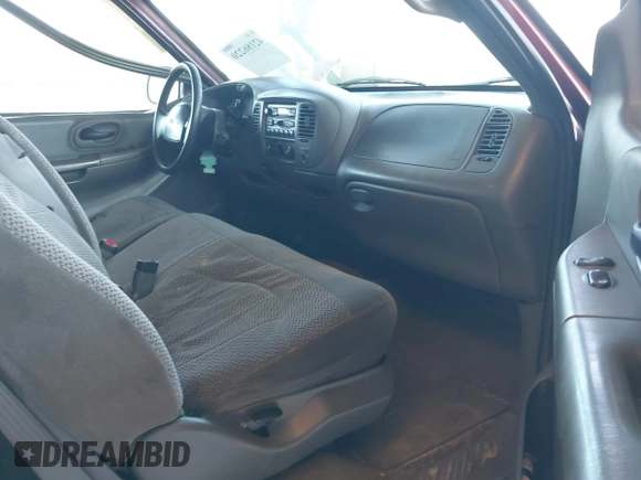 1999 Ford F-150 z VIN 1FTZX1721XNA79241, wystawiony jako IAAI lot #42186220 z przebiegiem Nie podano mil oraz . Historia ofert i sprzedaży dostępna na DreamBid. Obrazek 5.