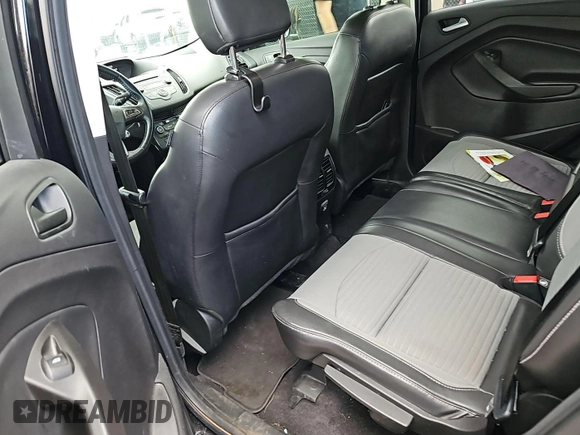 2018 Ford Escape SE z VIN 1FMCU9GDXJUA69802, wystawiony jako IAAI lot #42413413 z przebiegiem 92 564 mil mil oraz . Historia ofert i sprzedaży dostępna na DreamBid. Obrazek 16.