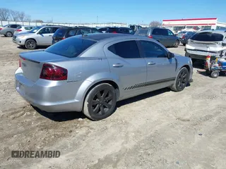 2014 Dodge Avenger SE with VIN 1C3CDZAG9EN222245, listed as a IAAI auction lot 41624596 with 123,890 mi miles and . Bid and sale history available at DreamBid. Image 4.