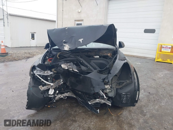 2021 Tesla Model Y Standard Range with VIN 5YJYGDED9MF103989, listed as a IAAI auction lot 41482268 with 33,485 mi miles and . Bid and sale history available at DreamBid. Image 13.