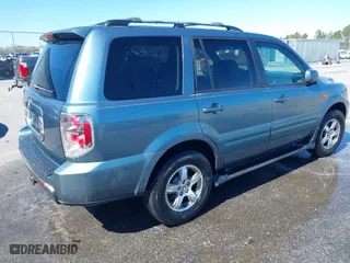 2006 Honda Pilot EX-L with VIN 5FNYF28586B004479, listed as a IAAI auction lot 41759406 with 301,087 mi miles. Bid and sale history available at carsss.com. Image 4.