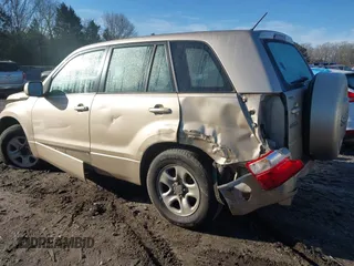 2008 Suzuki Grand Vitara with VIN JS3TE941884102058, listed as a IAAI auction lot 41433513 with 299,533 mi miles and . Bid and sale history available at DreamBid. Image 16.