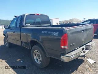 2001 Ford F-150 XL z VIN 2FTRX18L41CA04375, wystawiony jako IAAI lot #42443767 z przebiegiem 345 170 mil mil oraz . Historia ofert i sprzedaży dostępna na DreamBid. Obrazek 3.