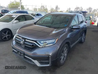 2020 Honda CR-V Touring z VIN 7FART6H91LE000684, wystawiony jako IAAI lot #42504731 z przebiegiem 49 100 mil mil oraz . Historia ofert i sprzedaży dostępna na DreamBid. Obrazek 2.