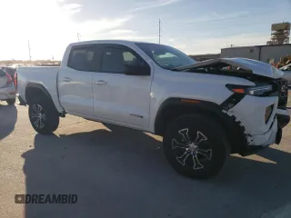 2023 GMC Canyon 4WD AT4 with VIN 1GTP6DEK6P1237045, listed as a Copart auction lot 74981784 with 18,036 mi miles and Salvage Title. Bid and sale history available at carsss.com. Image 4.