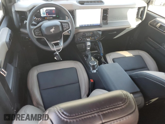 2024 Ford Bronco Wildtrak with VIN 1FMEE2BPXRLB16732, listed as a Copart auction lot 56394005 with 8,428 mi miles and Salvage title. Bid and sale history available at DreamBid. Image 8.